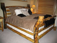 The Log Sleigh Bed